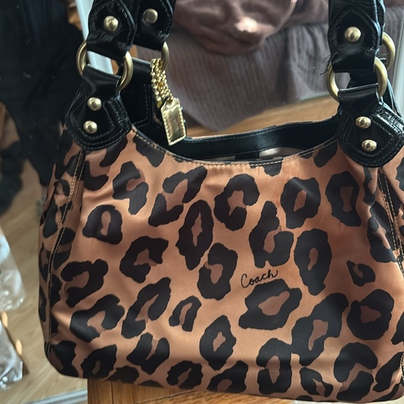 Coach Shoulder Bag. There are a few spots on the inside from make up. As is - Picture 4 of 5
